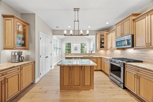 3602 Senate Ct, Adams Twp, PA 16059 - kitchen with stainless steel appliances, light wood-style floors, a center island, light stone counters, and recessed lighting