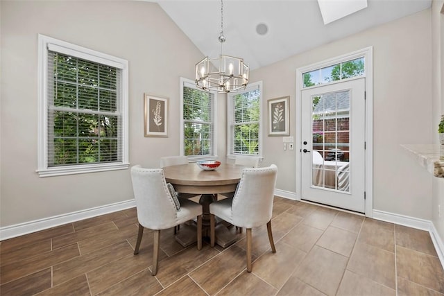 3602 Senate Ct, Adams Twp, PA 16059 - dining room with a chandelier, baseboards, lofted ceiling, and a skylight