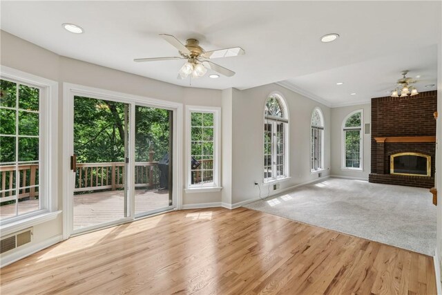 131 Hidden Valley Rd, Murrysville, PA 15146 - unfurnished living room with ceiling fan, healthy amount of natural light, baseboards, recessed lighting, and crown molding
