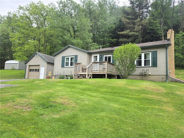 1126 Slate Point Rd, Parks Twp, PA 15690 - view of front facade with a garage, a wooden deck, a front lawn, an outbuilding, and a chimney