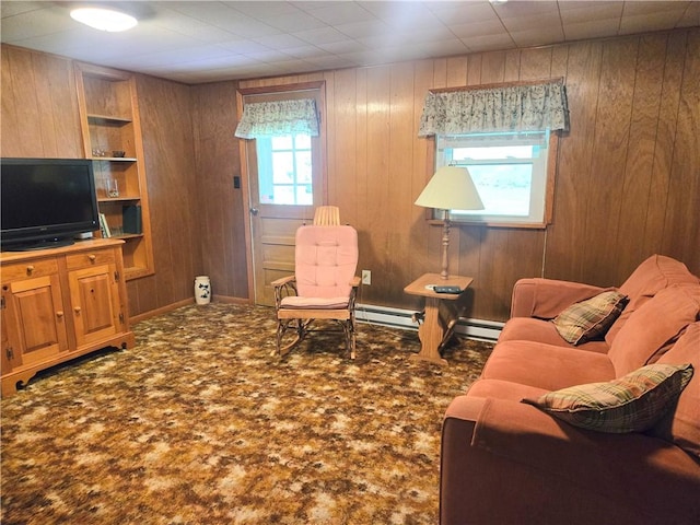 1126 Slate Point Rd, Parks Twp, PA 15690 - living area featuring wooden walls and a baseboard radiator
