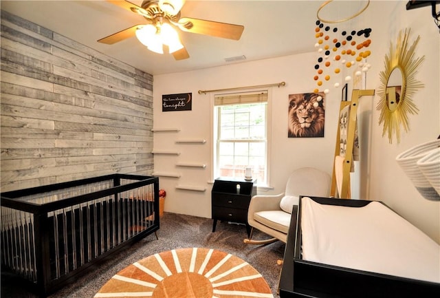 1726 Kennedy, Elizabeth Twp/Boro, PA 15018 - bedroom featuring carpet, wooden walls, and a ceiling fan