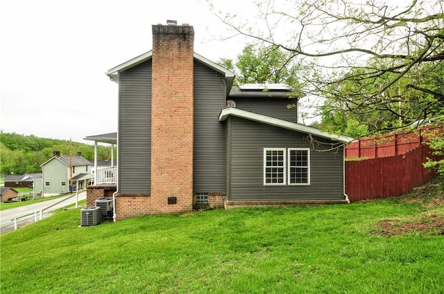 1726 Kennedy, Elizabeth Twp/Boro, PA 15018 - back of house with a chimney and central AC