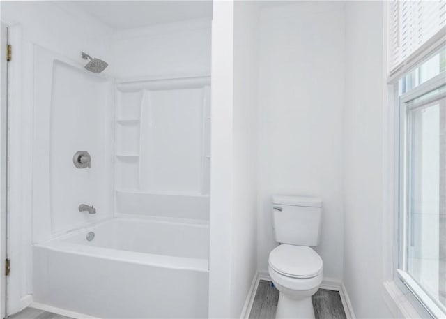 2324 Sheffield Rd, Aliquippa, PA 15001 - bathroom with shower / bath combination, toilet, baseboards, and wood finished floors