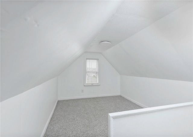 2324 Sheffield Rd, Aliquippa, PA 15001 - additional living space with baseboards, vaulted ceiling, and carpet floors
