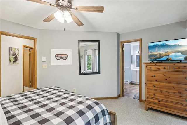 1630 Snowfield Way, Hidden Valley, PA 15502 - bedroom featuring light carpet, baseboard heating, baseboards, connected bathroom, and a ceiling fan