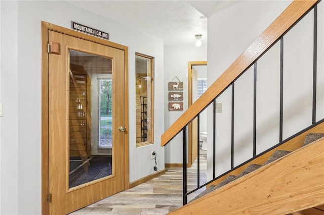1630 Snowfield Way, Hidden Valley, PA 15502 - entrance foyer with wood finished floors, stairway, and baseboards