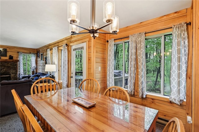 1630 Snowfield Way, Hidden Valley, PA 15502 - dining space with wood walls and a chandelier