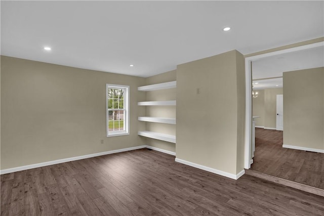 46 Terrace Rd, East Bethlehem, PA 15348 - spare room with dark wood-type flooring, built in shelves, baseboards, and recessed lighting