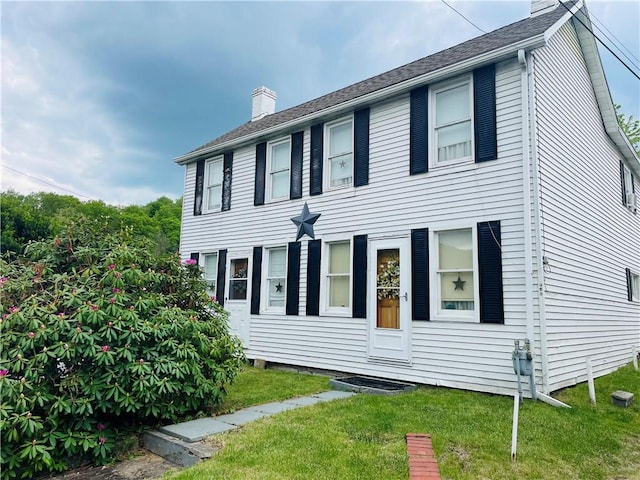 353 S Washington St, Waynsbrg/Frankln Twp, PA 15370 - rear view of house with a chimney and a lawn