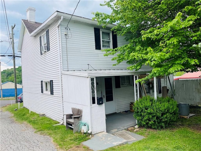 353 S Washington St, Waynsbrg/Frankln Twp, PA 15370 - view of front of property featuring a chimney and a porch