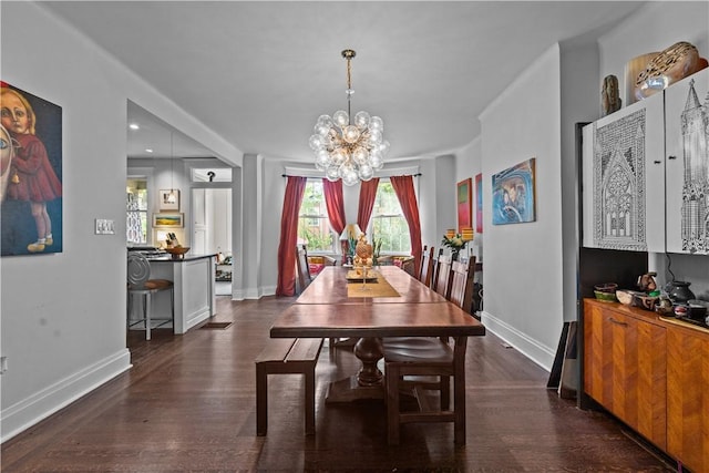 618 Hastings St, Point Breeze, PA 15206 - dining space featuring a chandelier, dark wood-type flooring, and baseboards