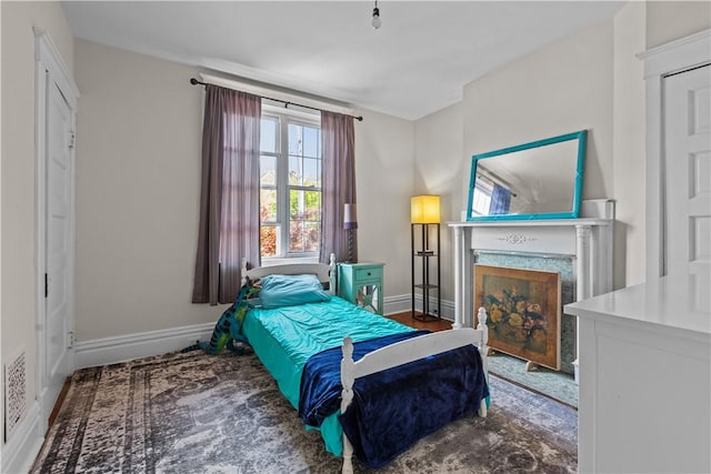 618 Hastings St, Point Breeze, PA 15206 - bedroom with baseboards and a fireplace