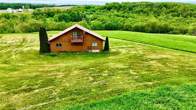 152 Aviator Ln, Somerset Twp, PA 15541 - view of side of property with a lawn and a view of rural / pastoral area