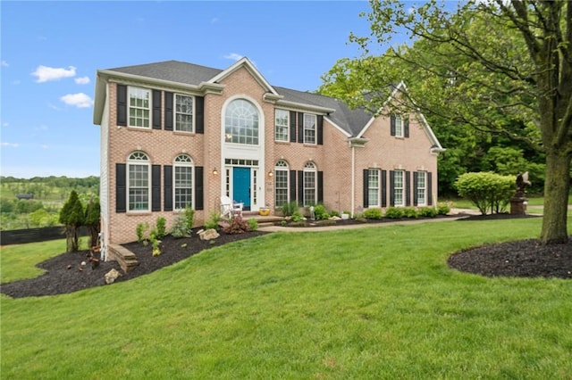 8426 David Dr, South Fayette, PA 15017 - view of front of property with brick siding and a front yard
