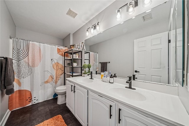 8426 David Dr, South Fayette, PA 15017 - full bath featuring double vanity, toilet, and a shower with shower curtain