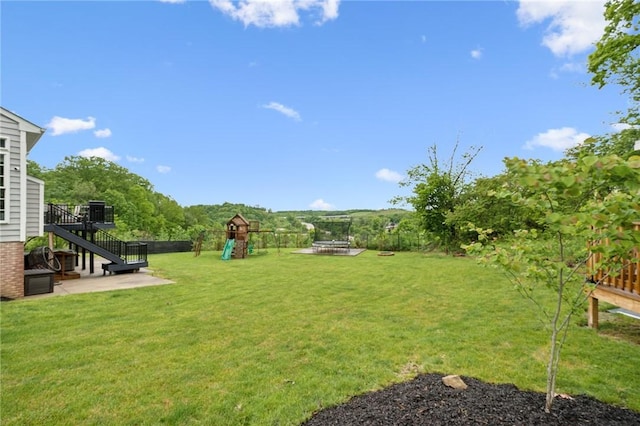 8426 David Dr, South Fayette, PA 15017 - view of yard featuring a playground, stairs, and a patio area