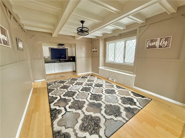 110 W Madison Ave, New Castle/7Th, PA 16102 - corridor with wood-type flooring, a sink, baseboards, and beamed ceiling