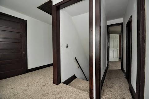 904 Mcclintock Ave, Washington Twp Fay, PA 15012 - hall featuring an upstairs landing, carpet floors, and baseboards