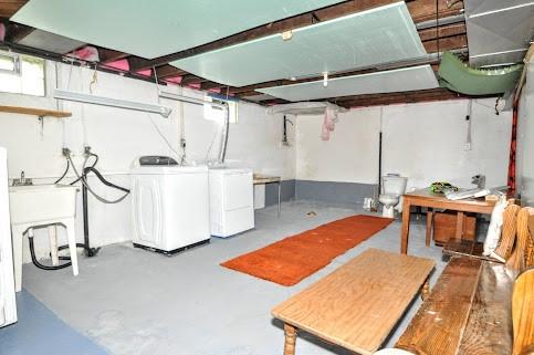 904 Mcclintock Ave, Washington Twp Fay, PA 15012 - unfinished below grade area featuring washer and dryer