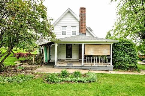 904 Mcclintock Ave, Washington Twp Fay, PA 15012 - rear view of house with a yard, a porch, and a chimney