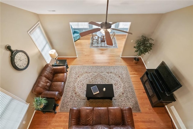 230 Patriot Ln, Economy, PA 15042 - living area with wood finished floors, ceiling fan, and baseboards