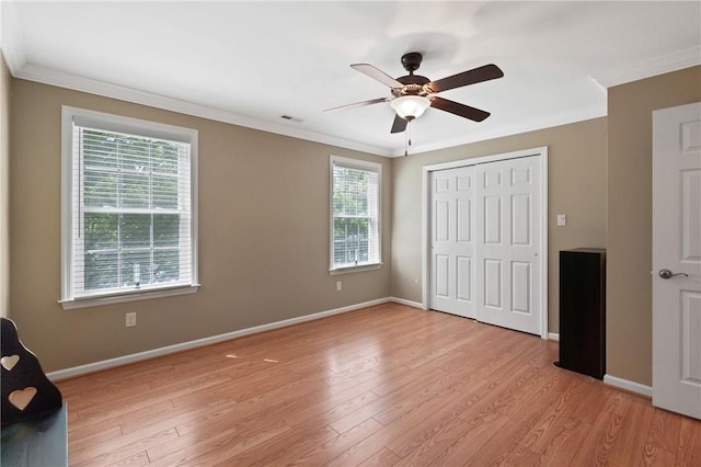 230 Patriot Ln, Economy, PA 15042 - unfurnished bedroom featuring multiple windows, ornamental molding, baseboards, and light wood finished floors