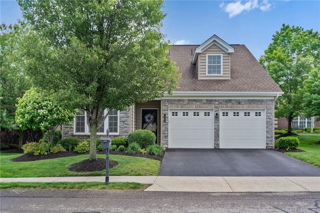 230 Patriot Ln, Economy, PA 15042 - view of front of home featuring stone siding, asphalt driveway, a garage, and roof with shingles
