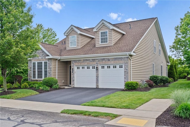 230 Patriot Ln, Economy, PA 15042 - view of front of property with stone siding, asphalt driveway, roof with shingles, and a garage
