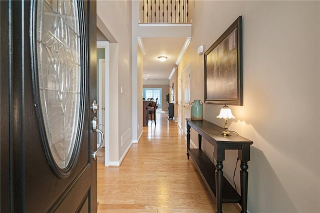 230 Patriot Ln, Economy, PA 15042 - entryway with light wood-type flooring, baseboards, and ornamental molding