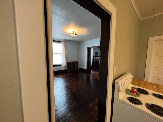 201 Thompson St, Latrobe, PA 15650 - corridor featuring radiator, dark wood-style floors, crown molding, attic access, and baseboards