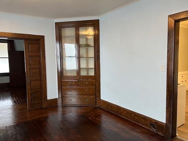 201 Thompson St, Latrobe, PA 15650 - empty room featuring wood-type flooring, ornamental molding, and washer / clothes dryer