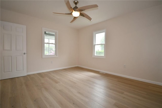 4 Brentwood Dr, Kennedy Twp, PA 15136 - empty room featuring healthy amount of natural light, a ceiling fan, and light wood finished floors
