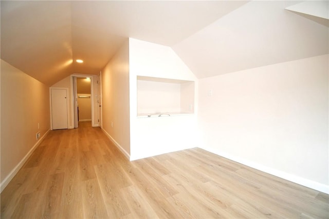 4 Brentwood Dr, Kennedy Twp, PA 15136 - additional living space featuring lofted ceiling, light wood-style flooring, and baseboards
