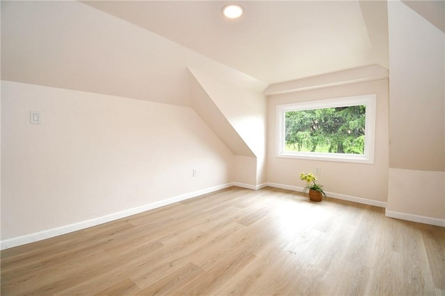 4 Brentwood Dr, Kennedy Twp, PA 15136 - bonus room with light wood-type flooring, baseboards, recessed lighting, and lofted ceiling