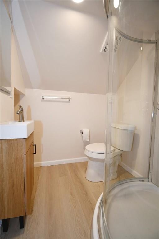 4 Brentwood Dr, Kennedy Twp, PA 15136 - bathroom featuring toilet, vanity, wood finished floors, a shower stall, and baseboards