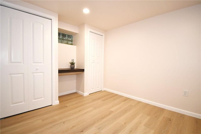 4 Brentwood Dr, Kennedy Twp, PA 15136 - unfurnished bedroom featuring baseboards, light wood-style floors, and recessed lighting