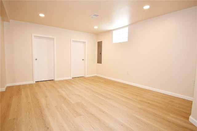 4 Brentwood Dr, Kennedy Twp, PA 15136 - below grade area with electric panel, recessed lighting, light wood-style floors, and baseboards