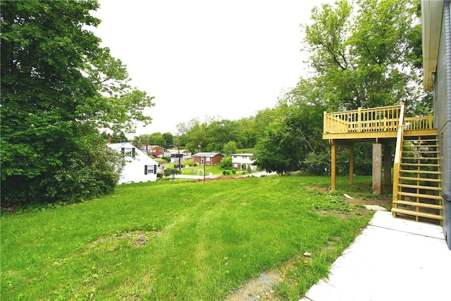 4 Brentwood Dr, Kennedy Twp, PA 15136 - view of grassy yard featuring stairs and a wooden deck