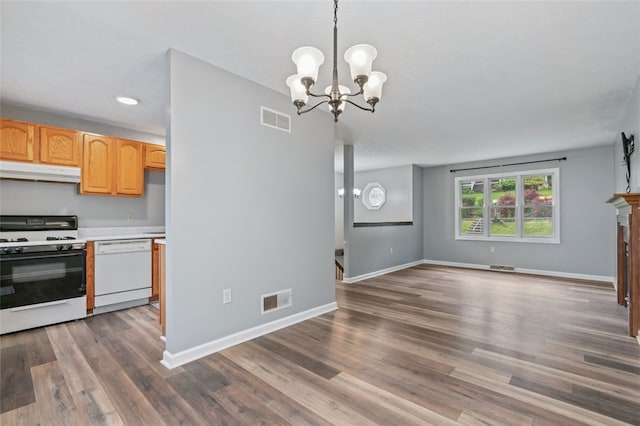 916 Timberland Ave, Brookline, PA 15226 - unfurnished dining area featuring a chandelier, dark wood finished floors, baseboards, recessed lighting, and a fireplace