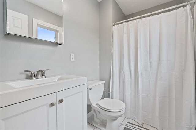916 Timberland Ave, Brookline, PA 15226 - bathroom with toilet, vanity, tile patterned floors, and a shower with shower curtain