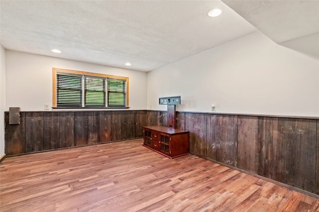 916 Timberland Ave, Brookline, PA 15226 - spare room featuring a wainscoted wall, wood finished floors, wooden walls, and recessed lighting