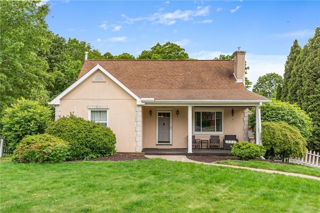 2400 James St, Hopewell Twp Bea, PA 15001 - view of front facade featuring covered porch, a chimney, stucco siding, and roof with shingles