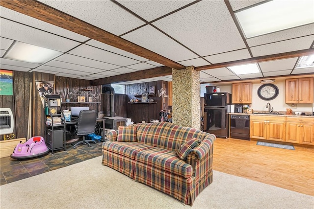 2400 James St, Hopewell Twp Bea, PA 15001 - living area featuring wood walls, a drop ceiling, a desk, light carpet, and heating unit