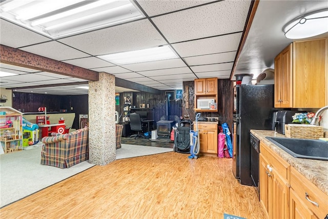 2400 James St, Hopewell Twp Bea, PA 15001 - kitchen with a sink, light countertops, white microwave, a drop ceiling, and light wood-style floors