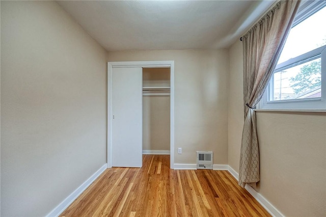 1566 Greentree Rd, Scott Twp Sal, PA 15220 - unfurnished bedroom with light wood-style flooring, baseboards, a closet, and heating unit