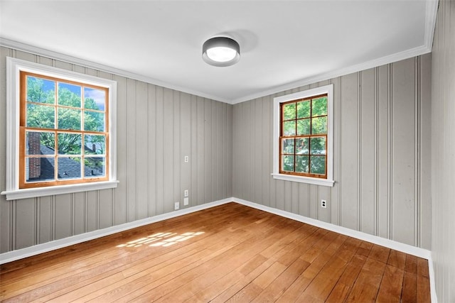 1509 Walnut St, Edgewood, PA 15218 - unfurnished room with wood-type flooring, baseboards, and ornamental molding