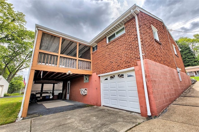 13749SAINTCLAIRDRIVE Circle Dr, North Huntingdon, PA 15642 - view of front of home featuring a garage, driveway, and brick siding