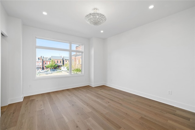 244 44th St, Lawrenceville, PA 15201 - spare room featuring wood finished floors, baseboards, and recessed lighting