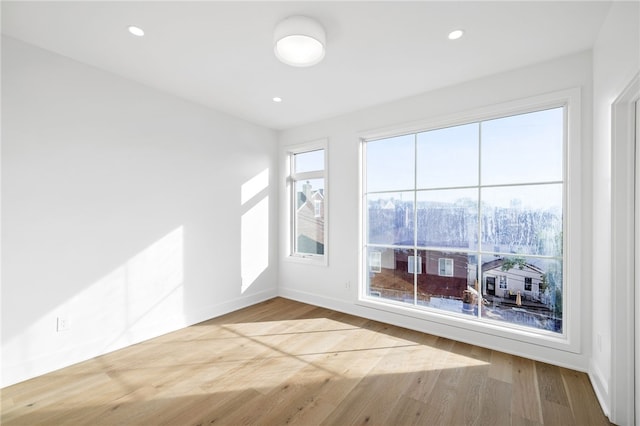 244 44th St, Lawrenceville, PA 15201 - spare room featuring wood finished floors, baseboards, and recessed lighting